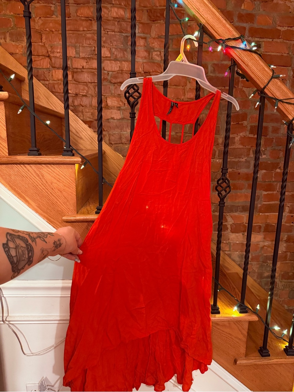 Love Chelsey Sleeveless Asymmetrical Ruffle-Hem Dress in Vibrant Red/Orange